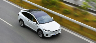 tesla driving on the highway
