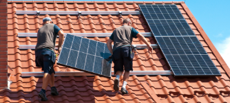 picture of installing solar panels on roof